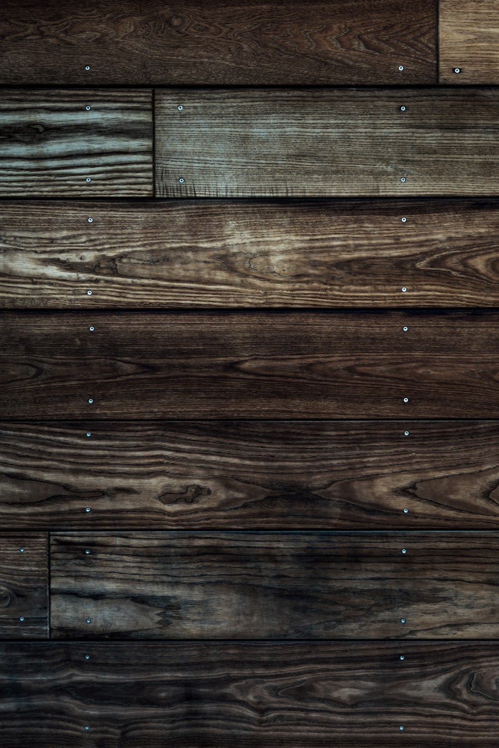 brown wooden floor with white textile