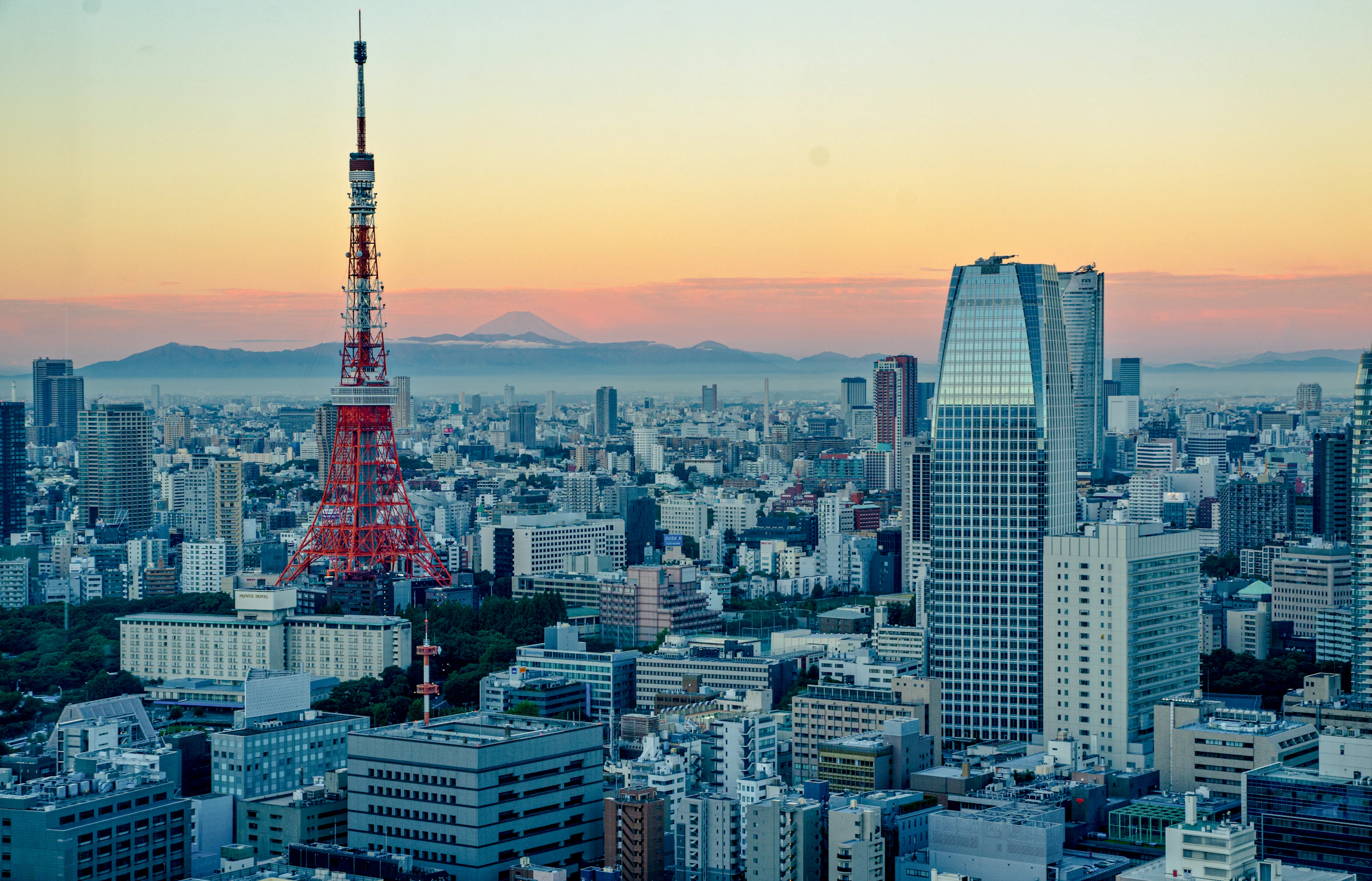 Tokyo Tower at sunset with Mount Fuji in the distance