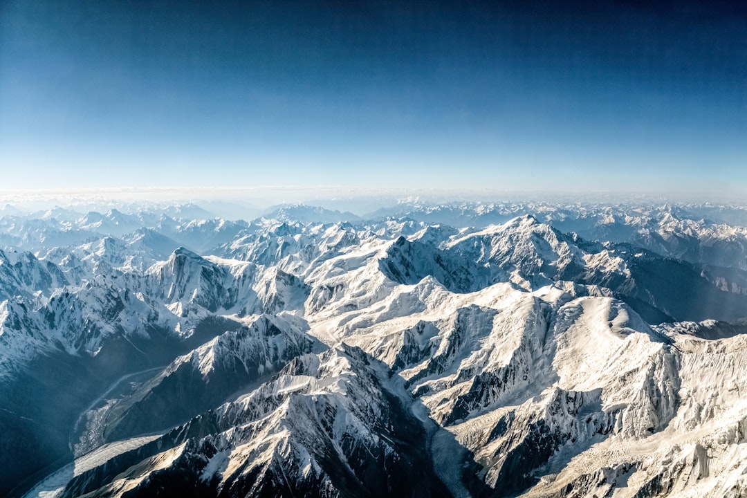 aerial view of snow covered mountains during daytime