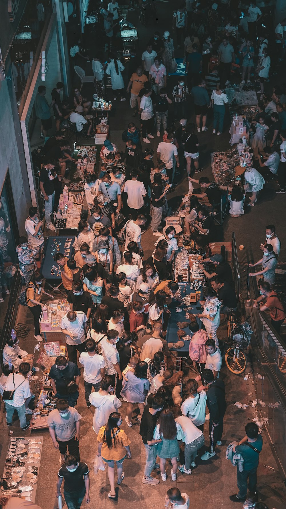 people sitting on brown wooden chairs