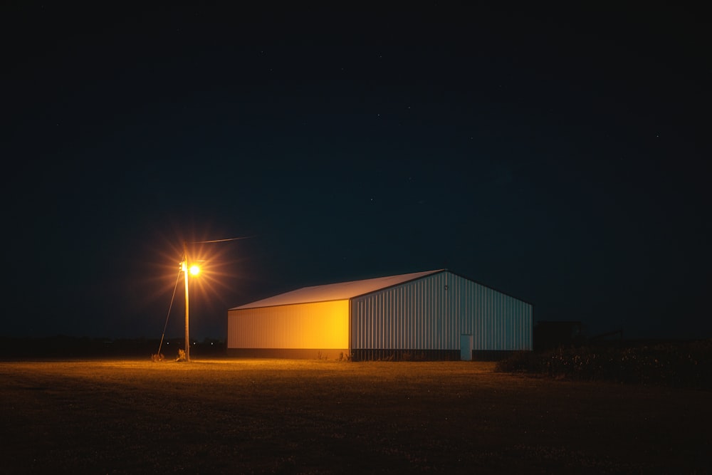 white and red building during night time