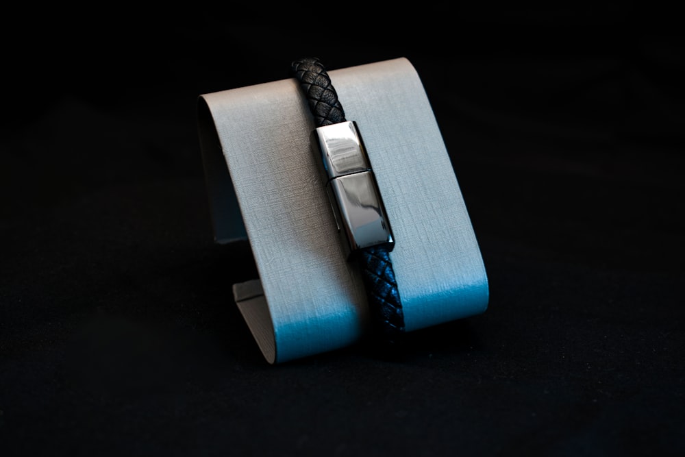 blue and silver belt buckle