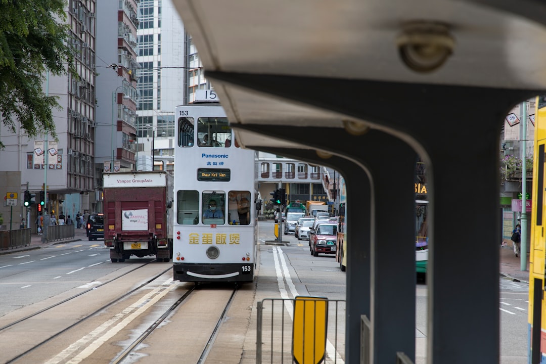 white and yellow train on rail road during daytime