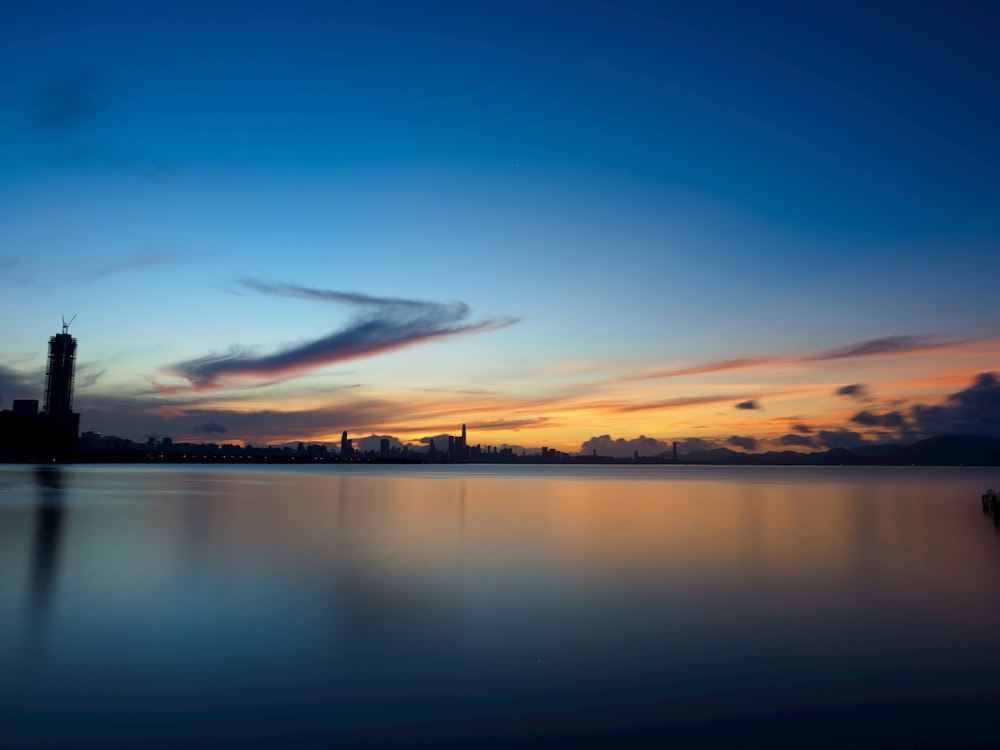 body of water under blue sky during daytime