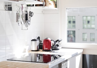 white wooden kitchen cabinet with sink