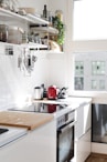 white wooden kitchen cabinet with sink