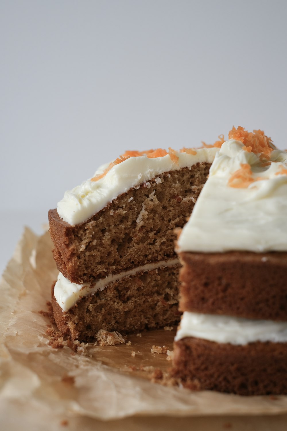 brown and white cake on white paper