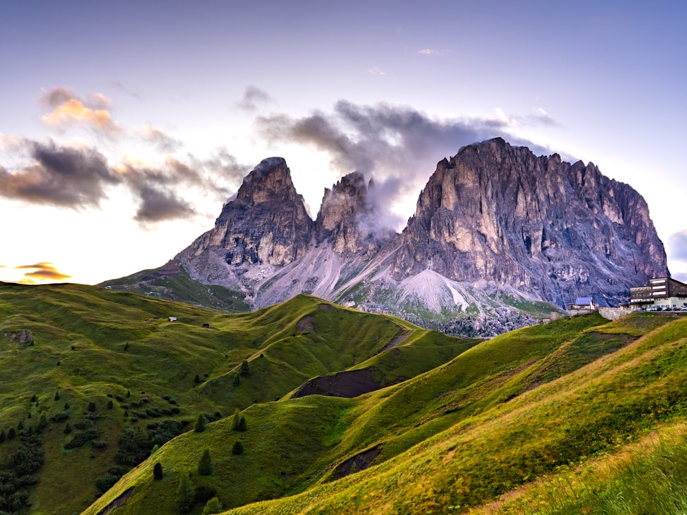 green and gray mountains under white clouds during daytime