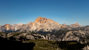 A breathtaking mountain landscape under a clear sky.