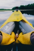 An influencer enjoying a serene lakeside moment with a branded kayak.