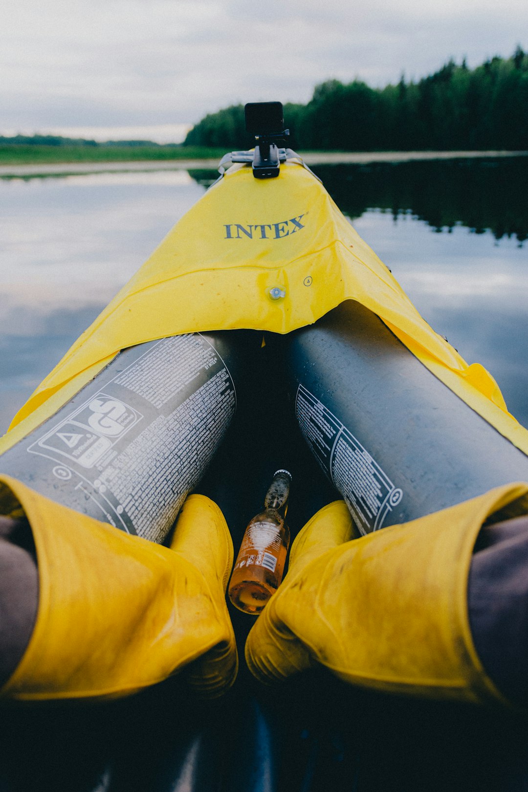 yellow kayak on body of water during daytime