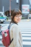 woman in white long sleeve shirt wearing black framed eyeglasses