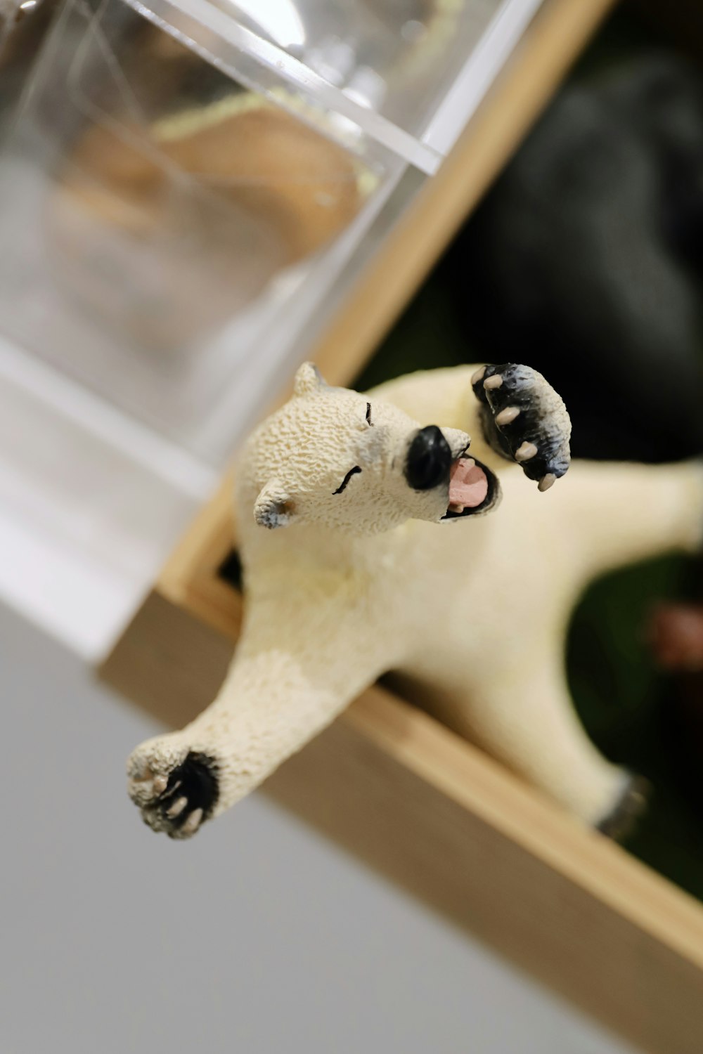 white and black dog figurine