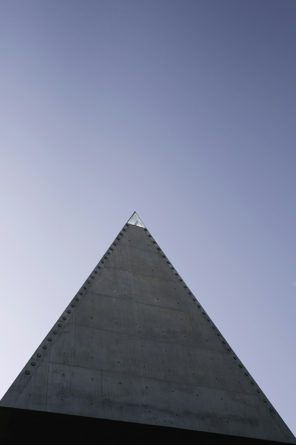 gray concrete building under blue sky during daytime