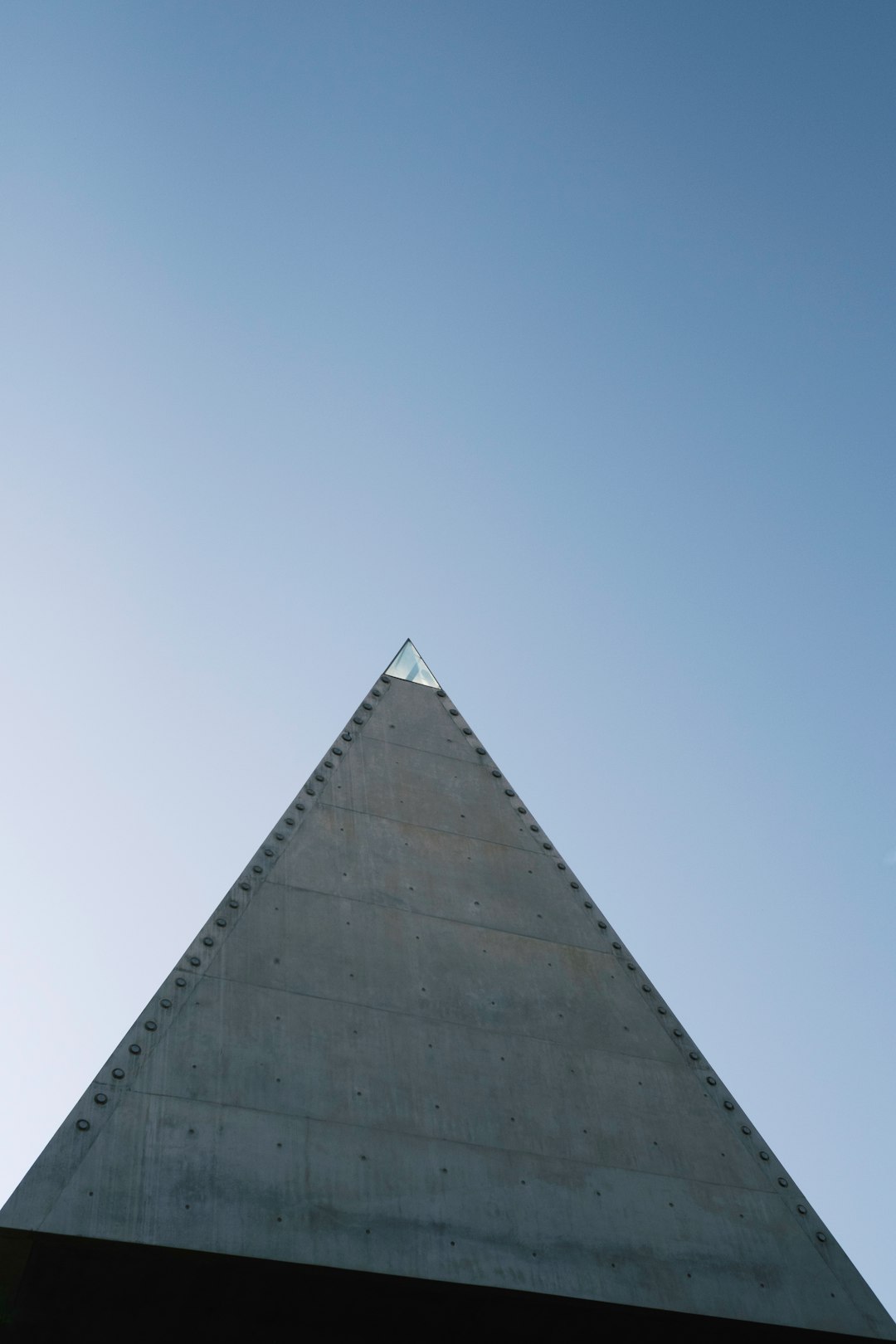 gray concrete building under blue sky during daytime