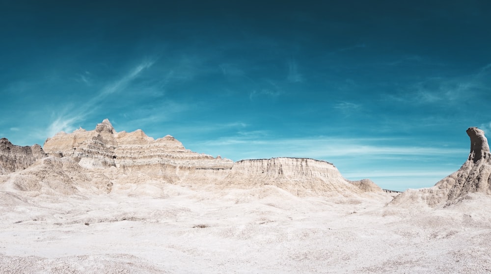 brown rocky mountain under blue sky during daytime