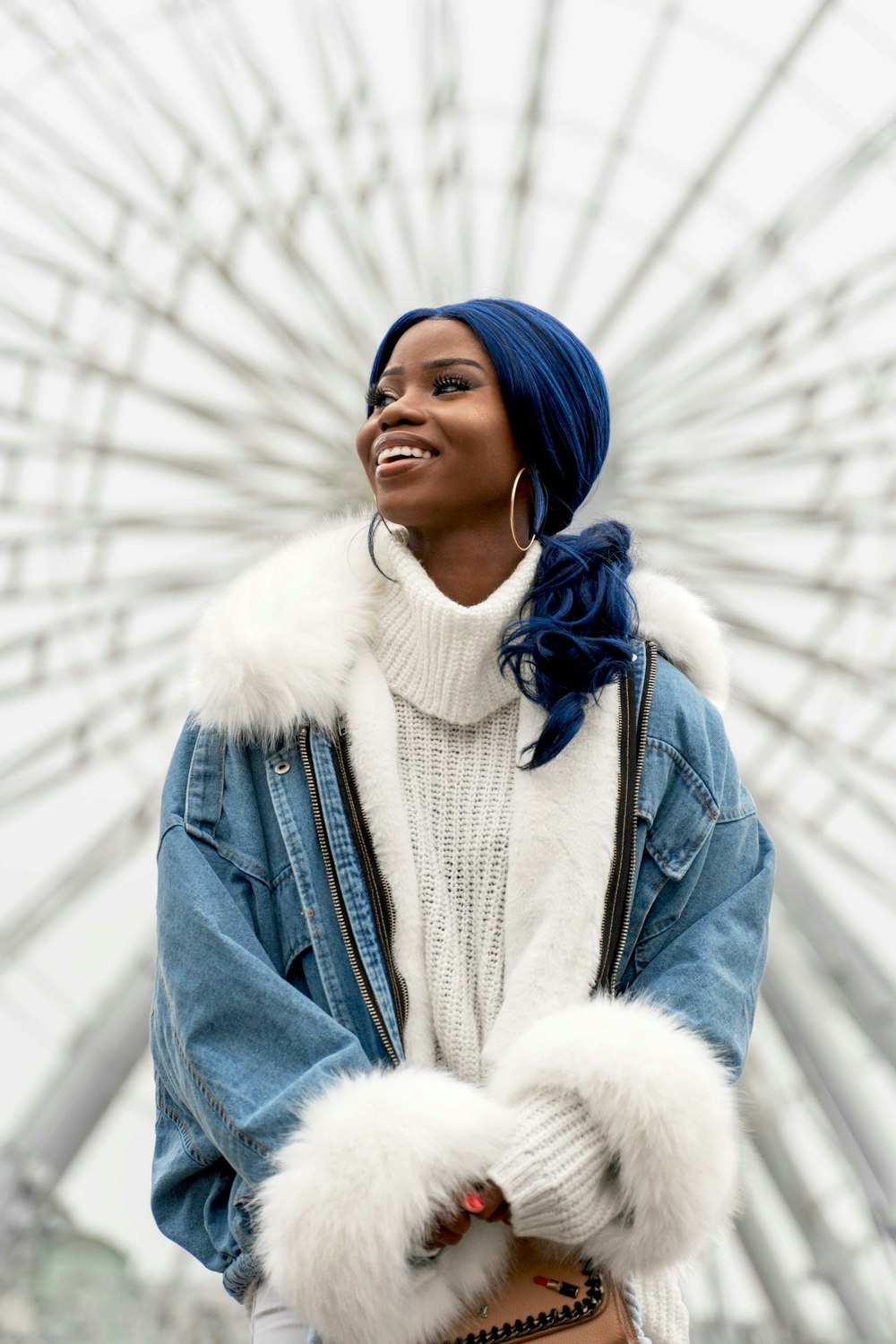 woman in blue denim jacket and white scarf