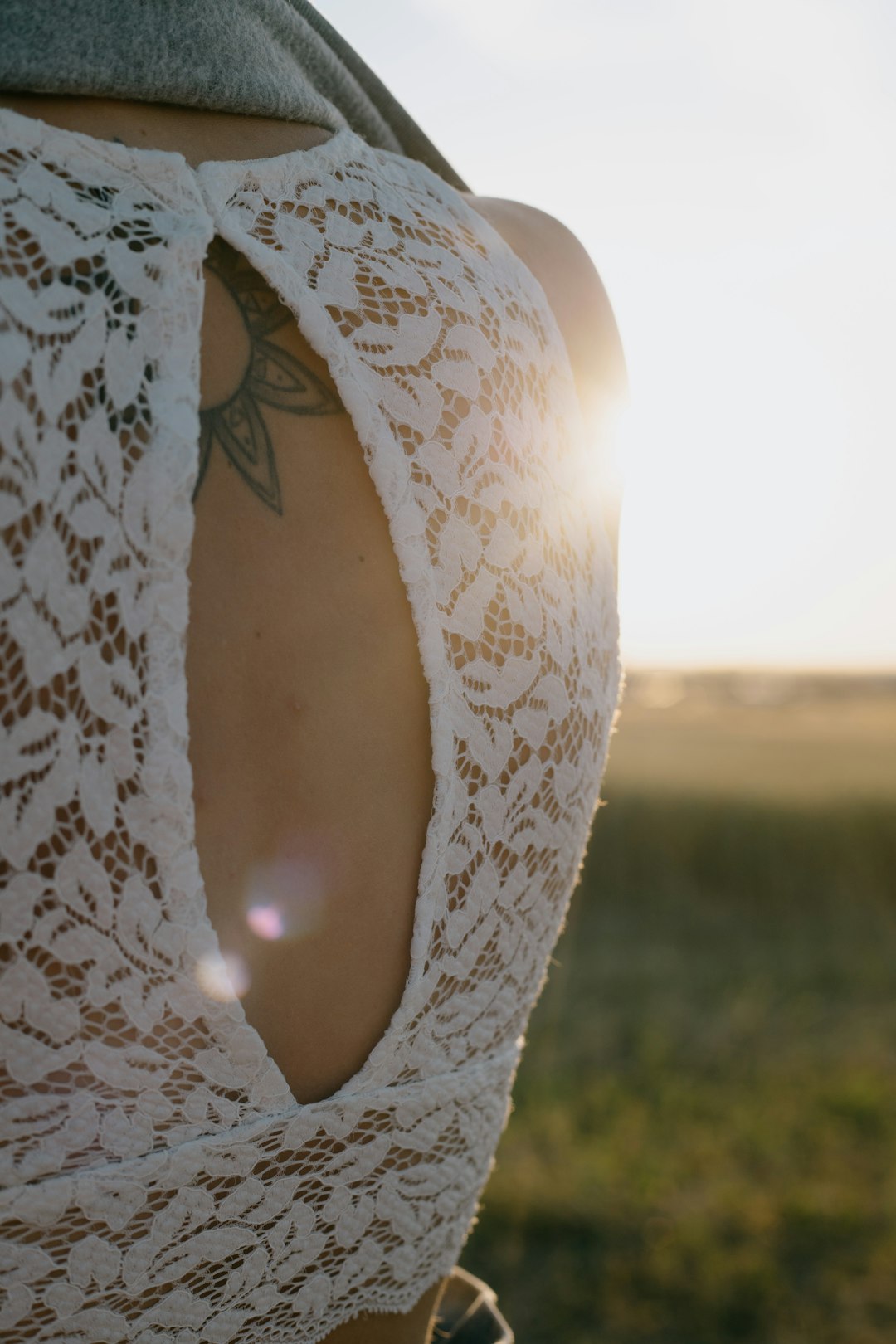 woman in white floral lace brassiere