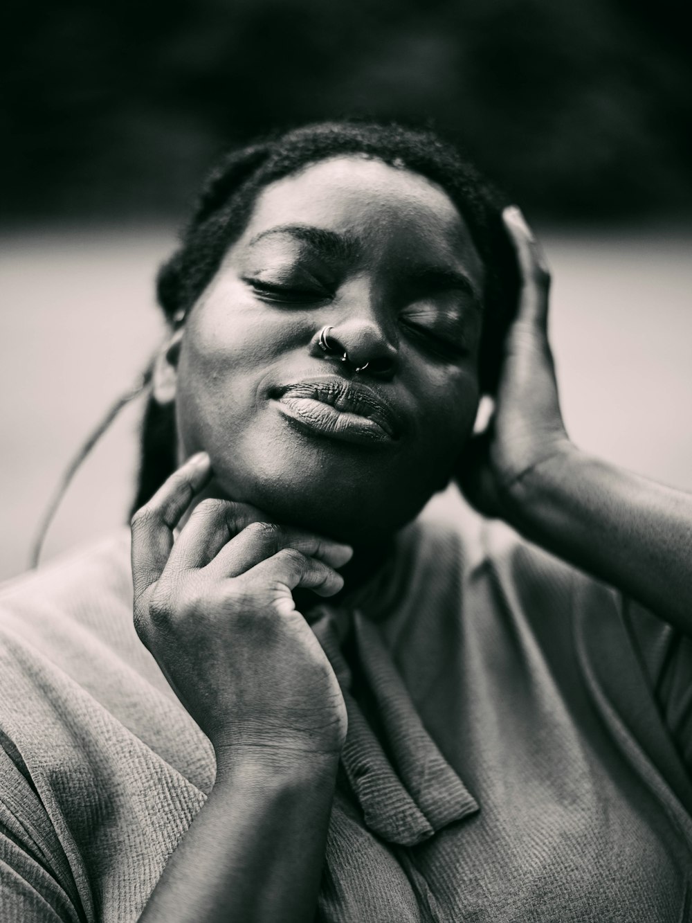 grayscale photo of woman in crew neck shirt