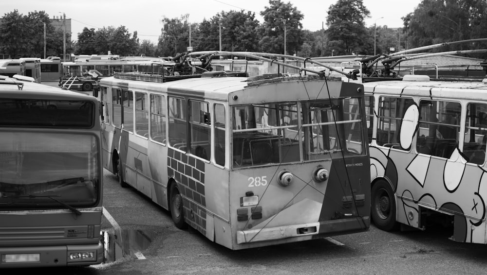 grayscale photo of bus on road