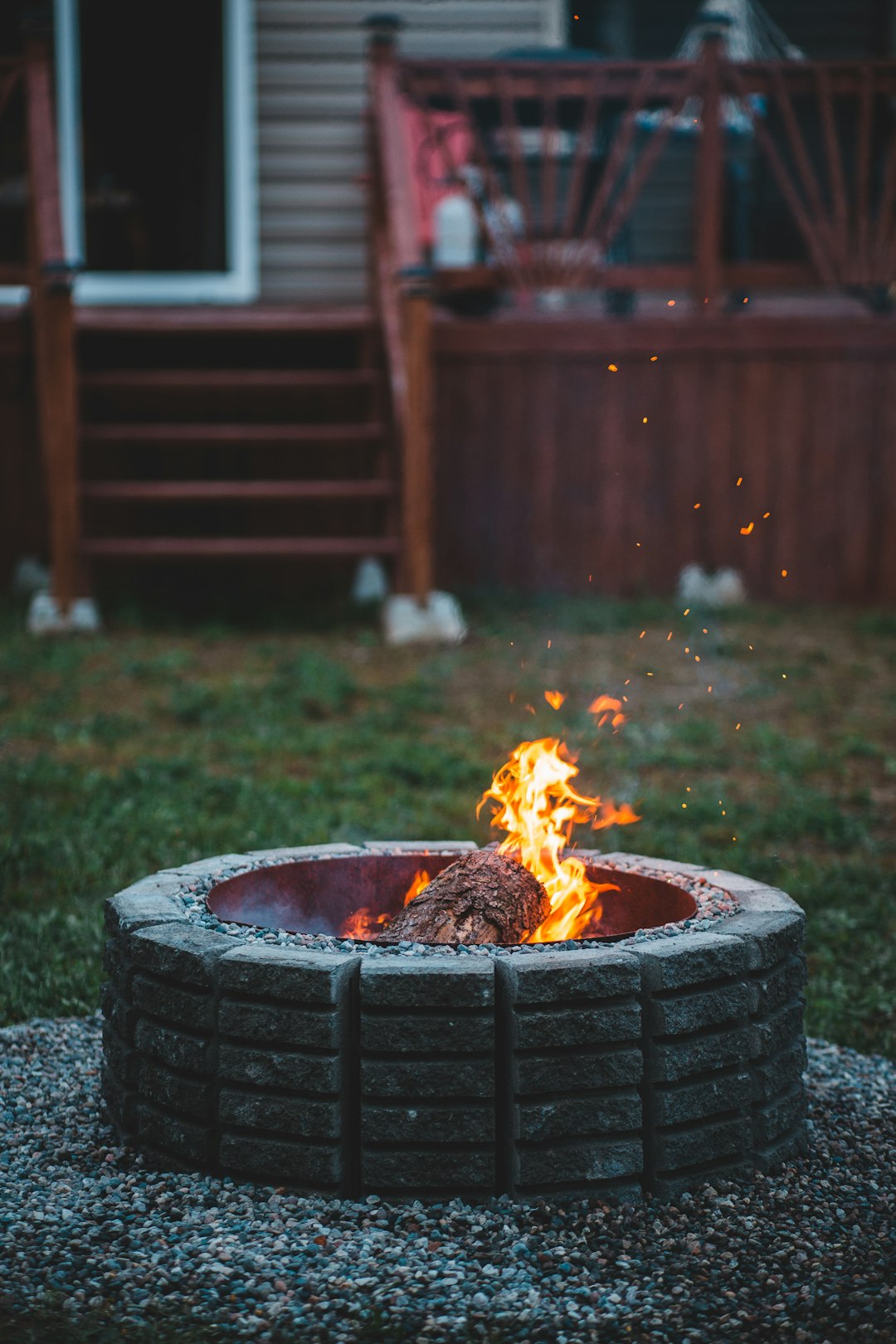 fire in round black fire pit