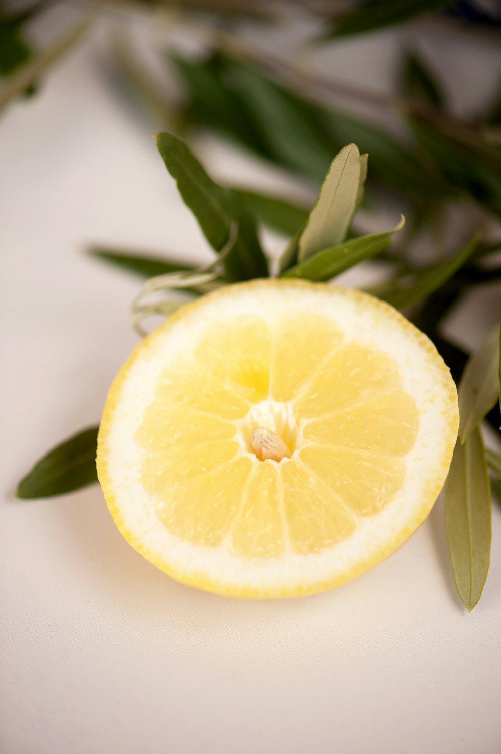 yellow lemon fruit on white table