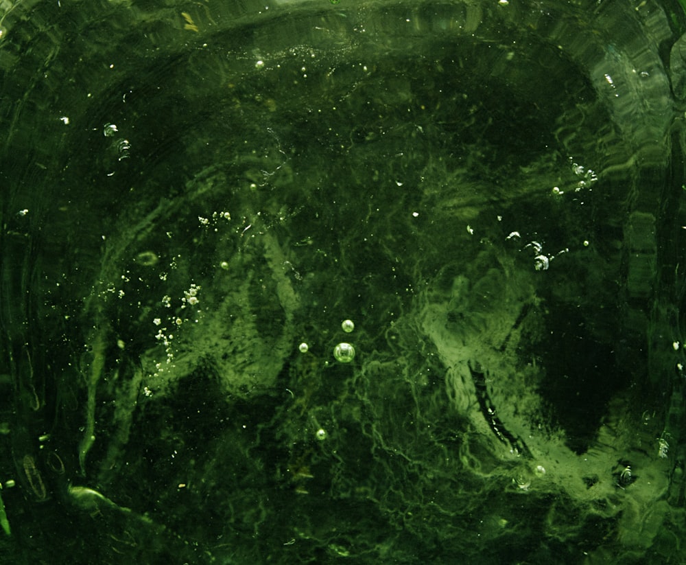 green and black abstract painting