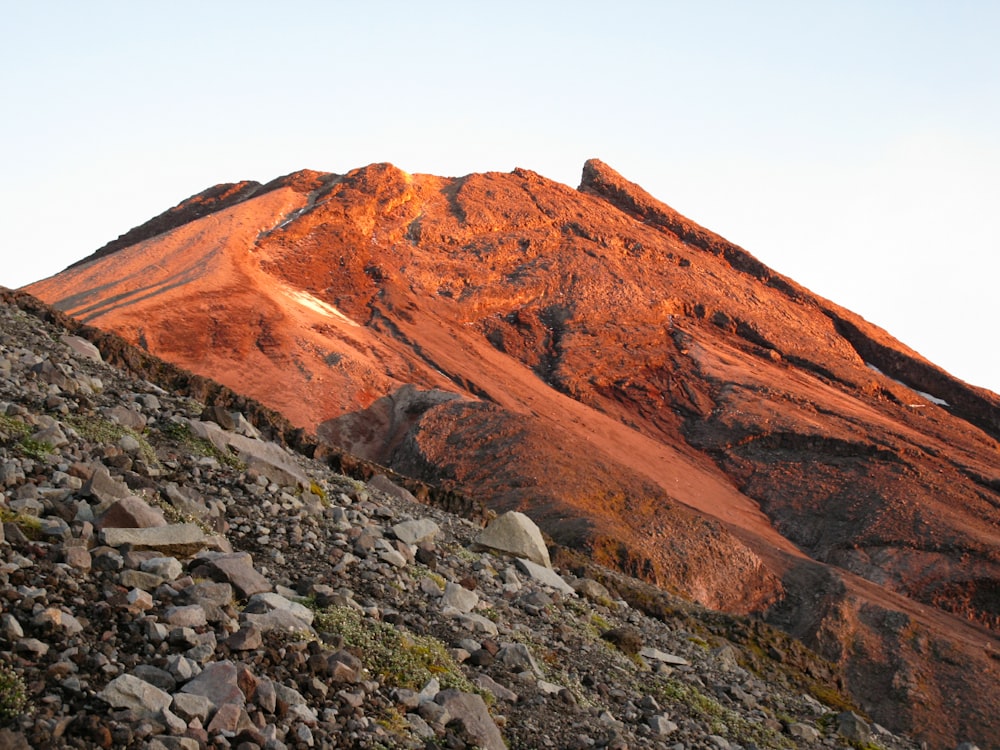 brown mountain under white sky during daytime