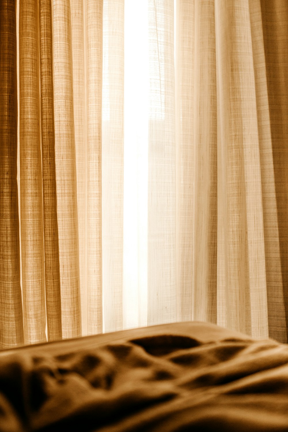 white window curtain near white window curtain