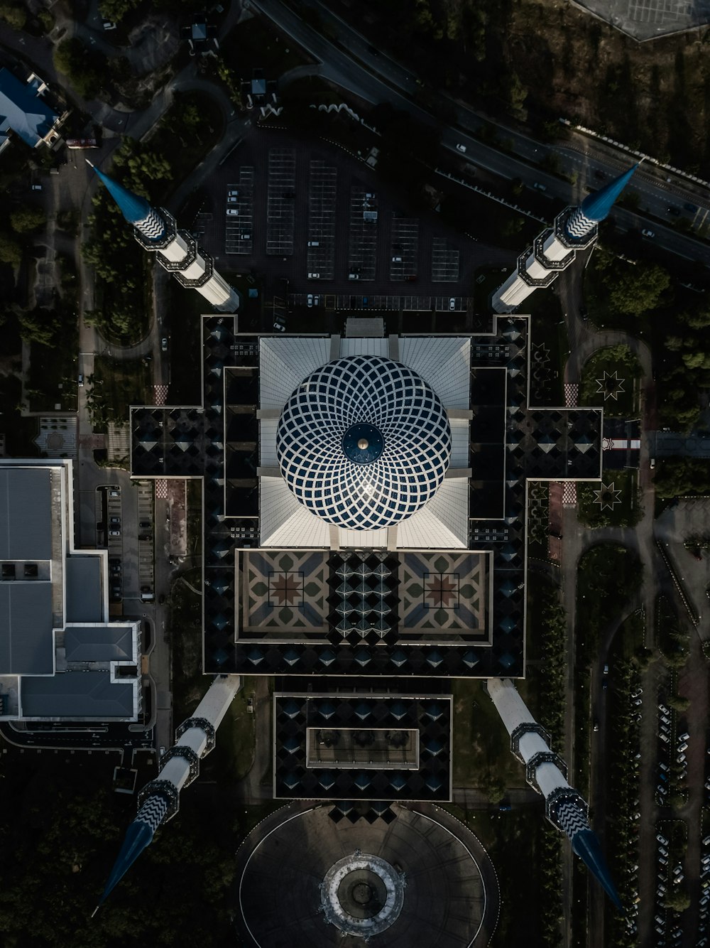 black and white building with lights turned on during night time