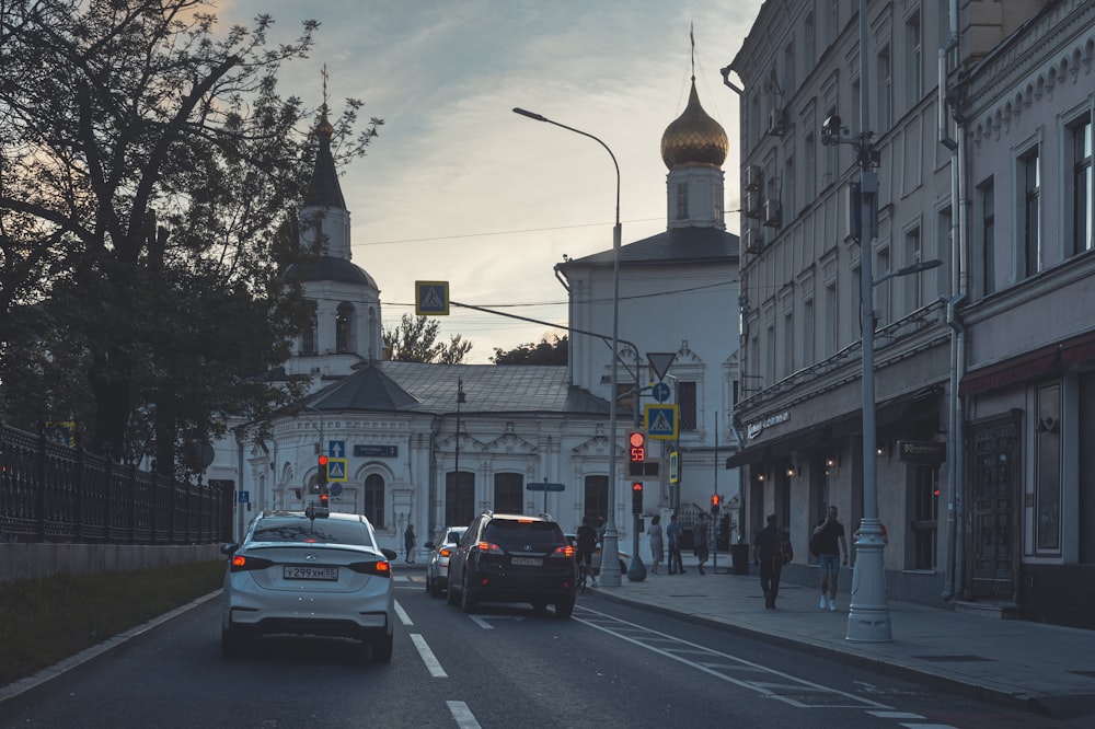 cars on road near buildings during daytime