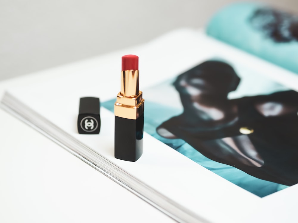 red lipstick on white table