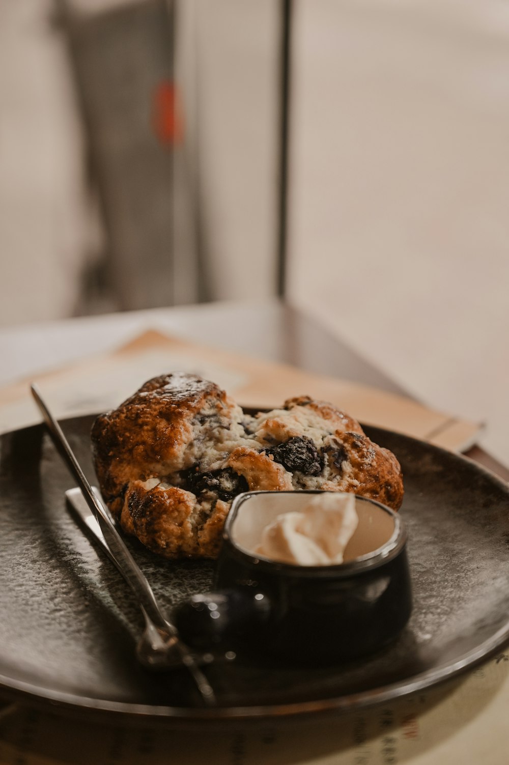 brown pastry on black ceramic plate