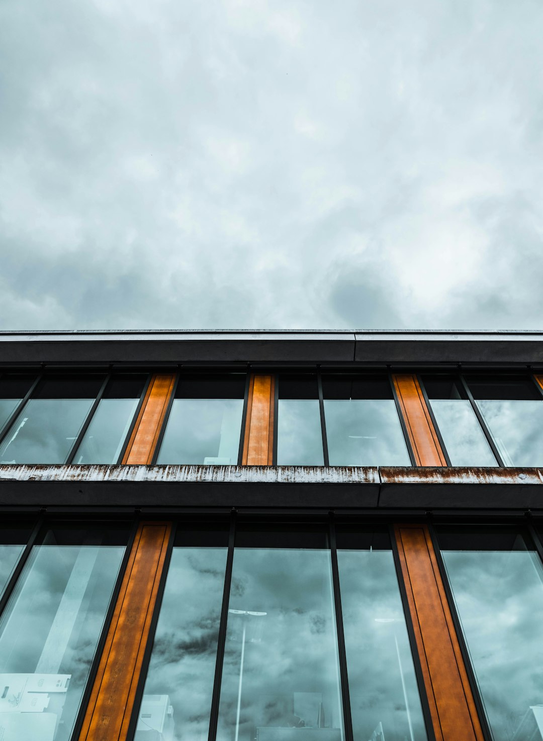 brown wooden framed glass window