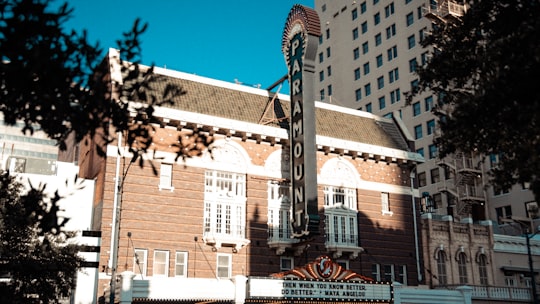 brown and white concrete building in The Paramount Theatre United States