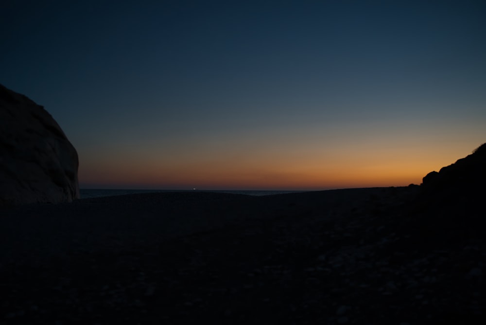 silhouette of mountain during sunset