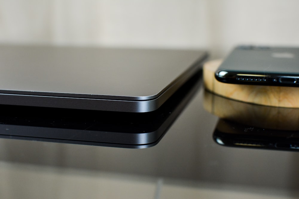 a close up of a cell phone on a table