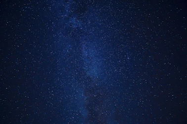 blue sky with stars during night time