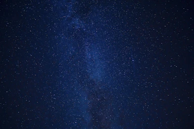blue sky with stars during night time