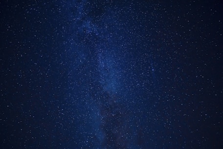 blue sky with stars during night time