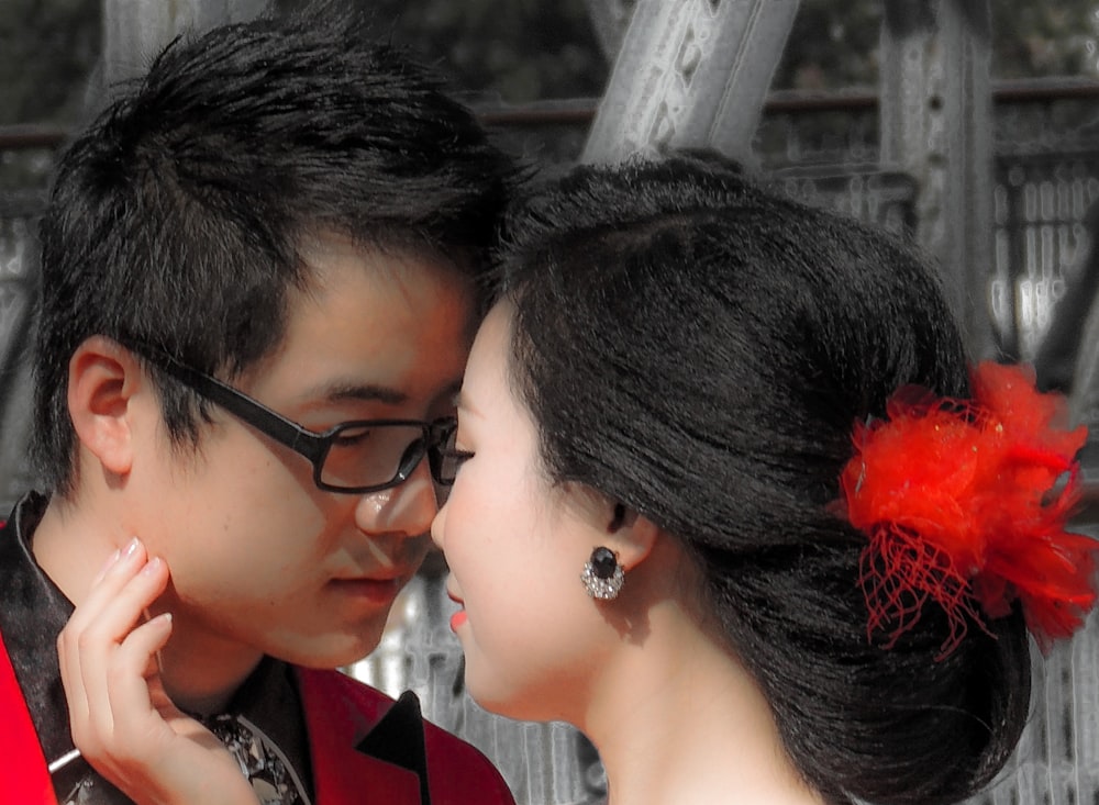 woman in black framed eyeglasses beside woman in black framed eyeglasses