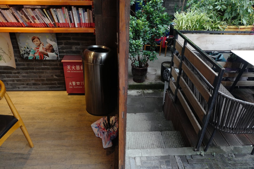 brown wooden shelf near brown wooden staircase