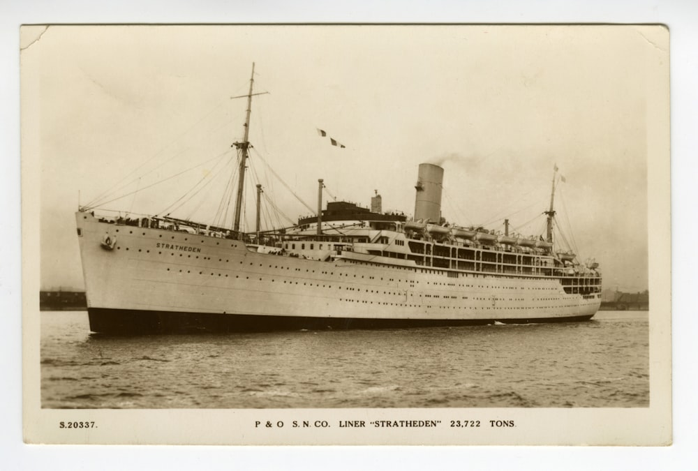 white and black cruise ship on sea