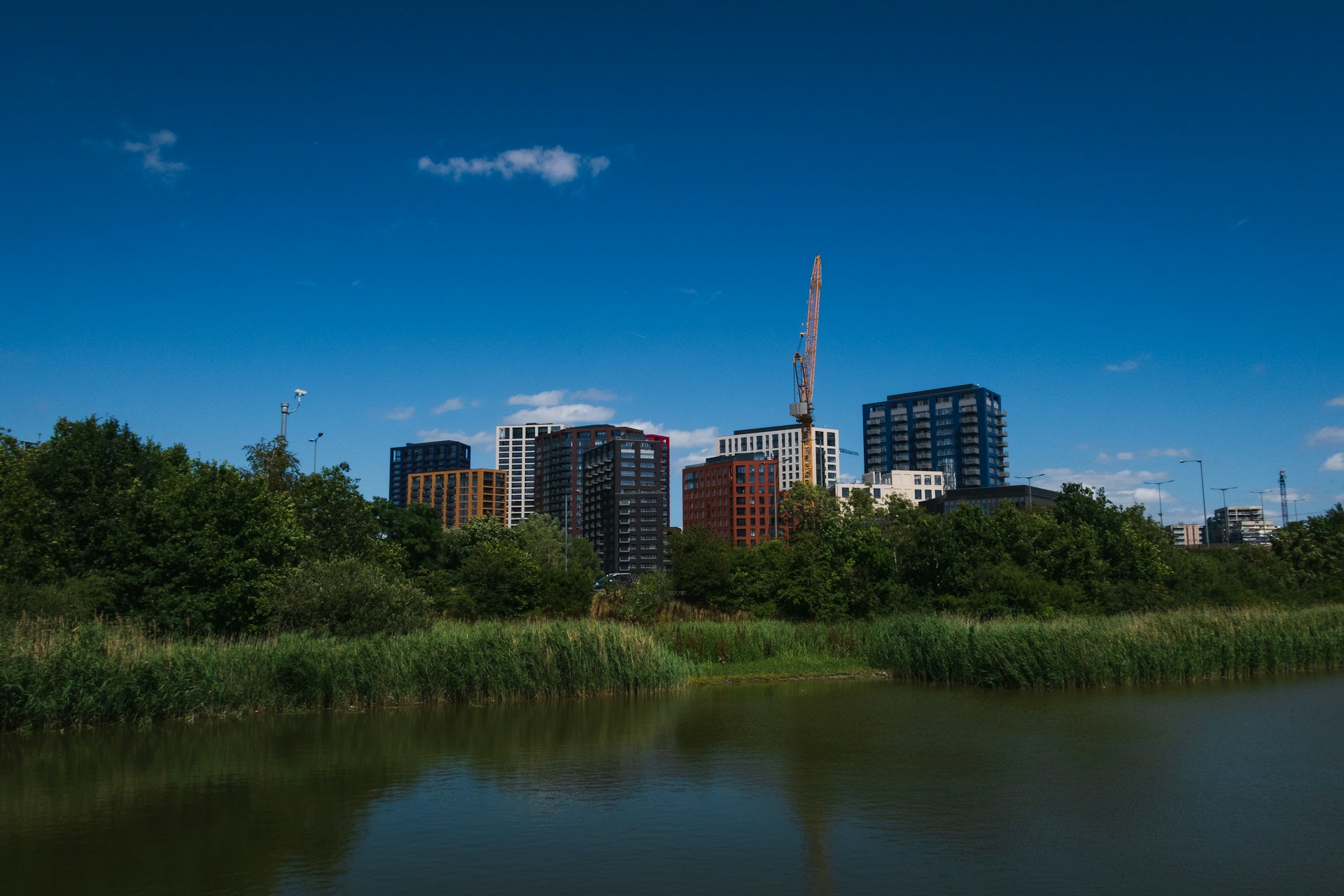 An image of Lumadan's town center with modern infrastructure progress under bright blue skies symbolizing development.