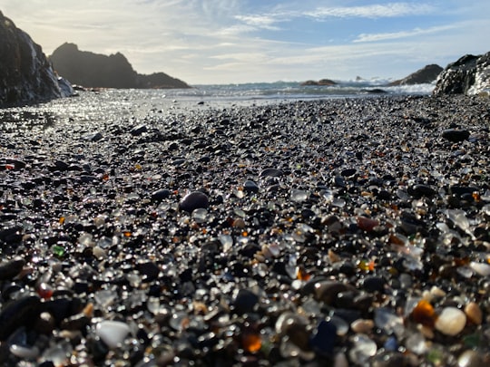 black and white stones on seashore during daytime in Fort Bragg United States