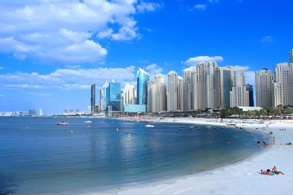 city skyline across the sea during daytime