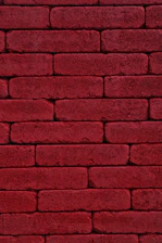 red brick wall during daytime