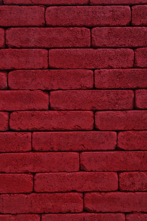 red brick wall during daytime