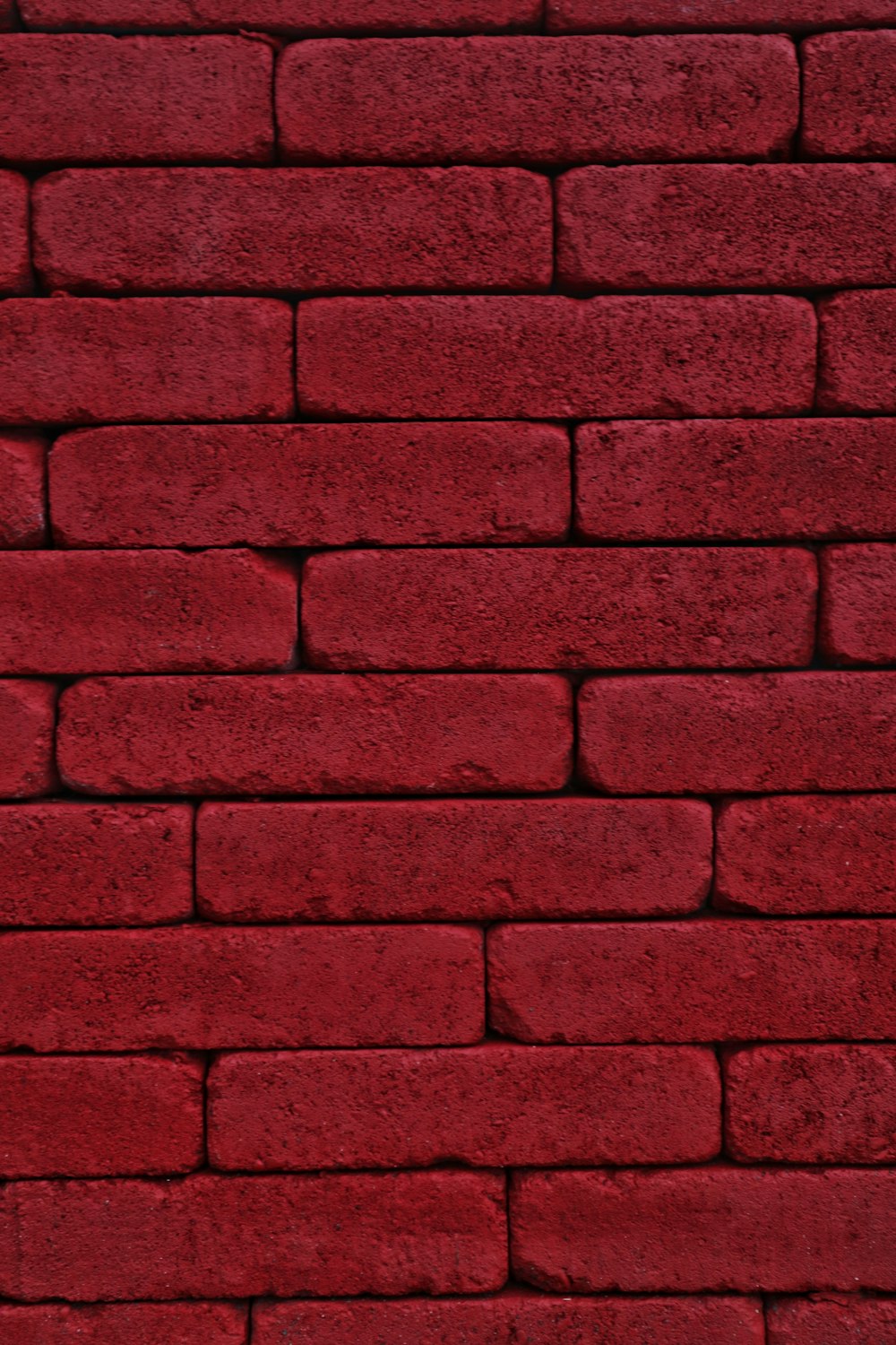 red brick wall during daytime