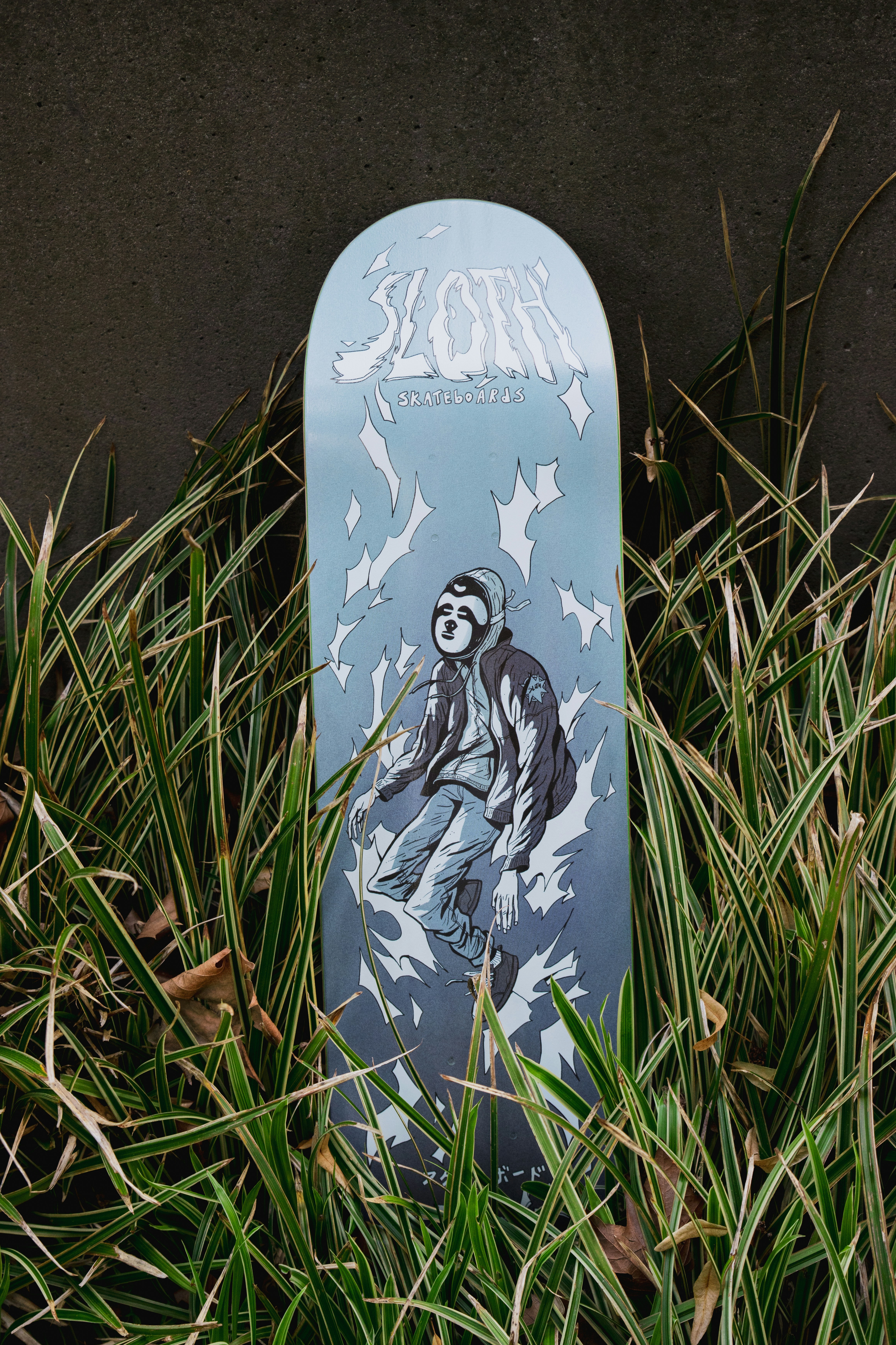 white and blue floral skateboard
